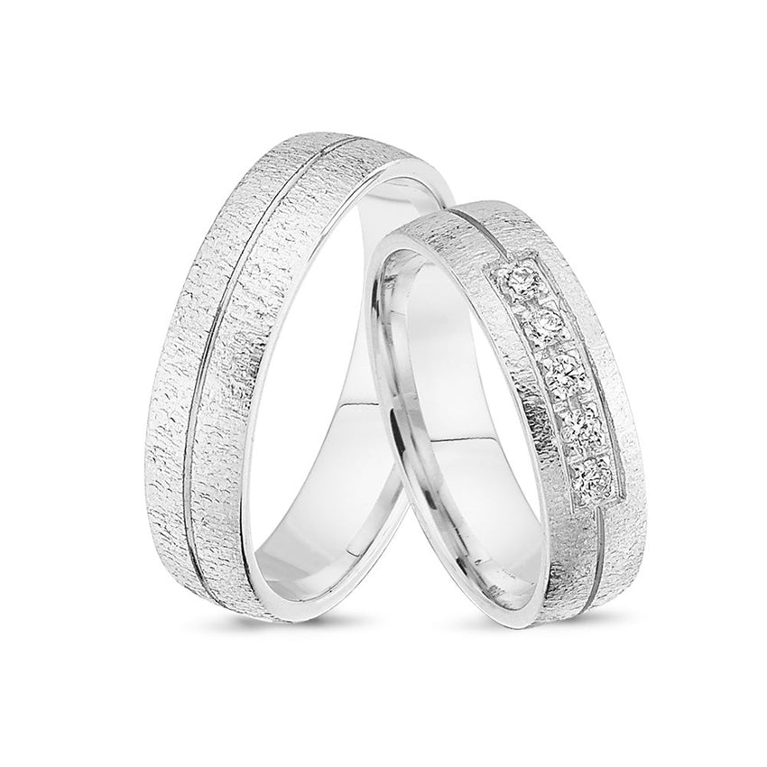 Smukke Nuran vielsesringe i 14 kt hvidguld med 0,125 ct diamanter